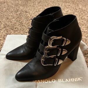 Manolo Blahnik EU 38. EUC 
Black ankle silver buckle boot